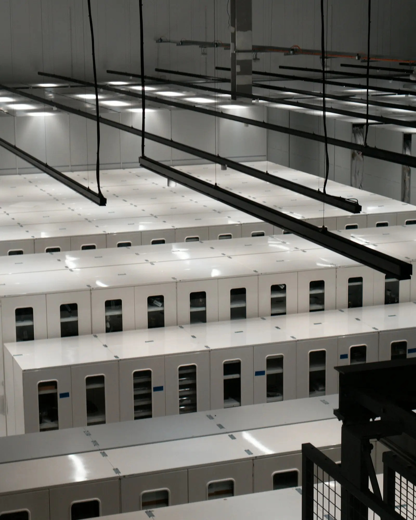 Rows of server cabinets in a data centre hall