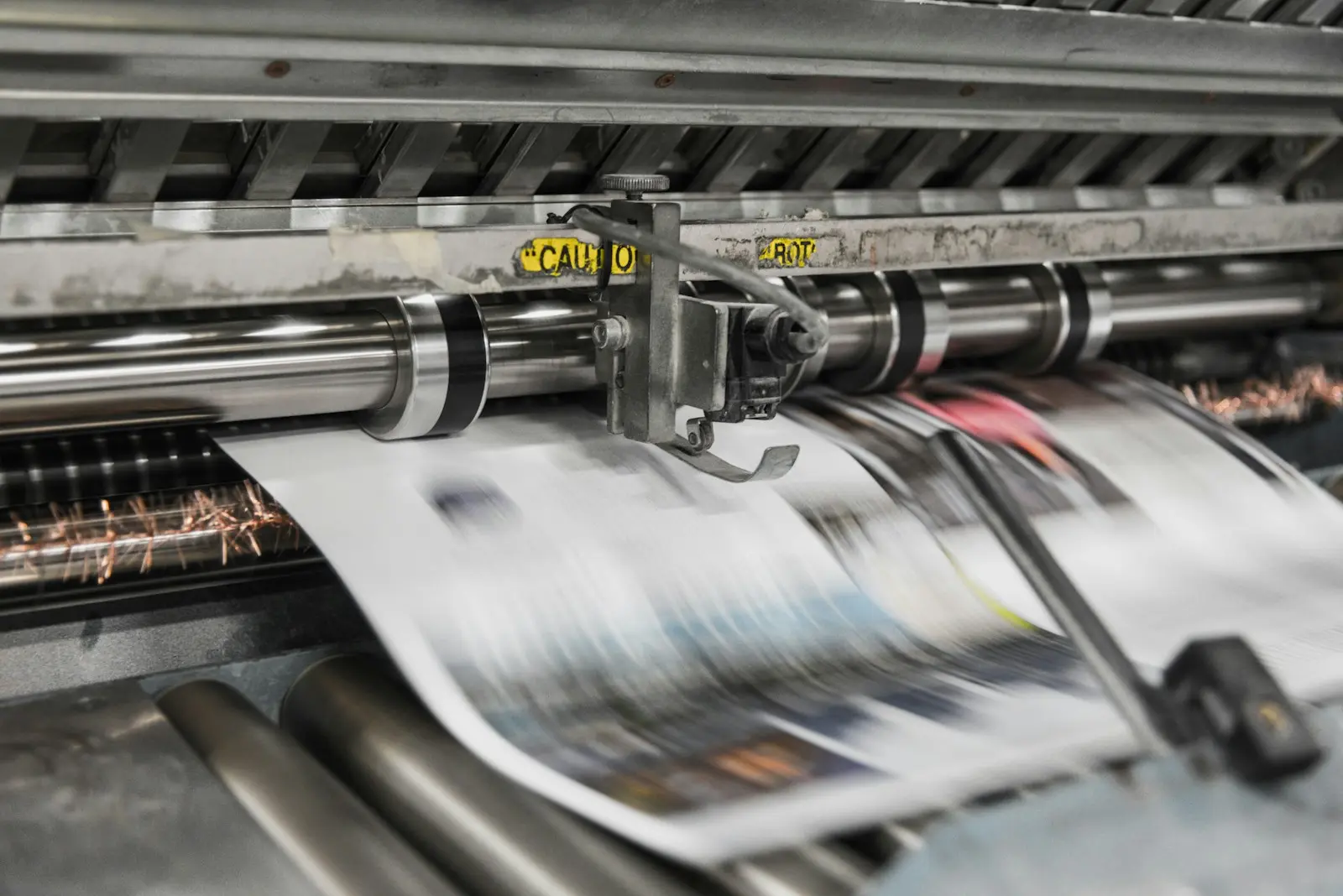 Web offset printing press running newsprint