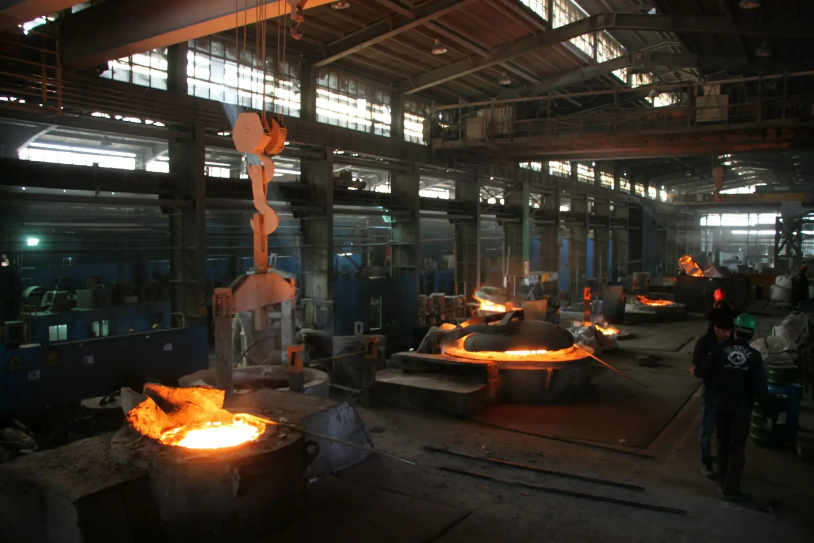Molten metal being poured in a steel foundry